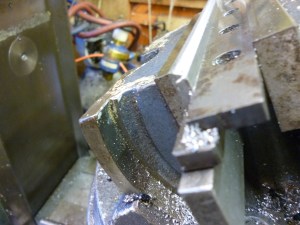 Milling one edge of the gib 422