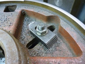 Using an existing hole in a workpiece for clamping 48